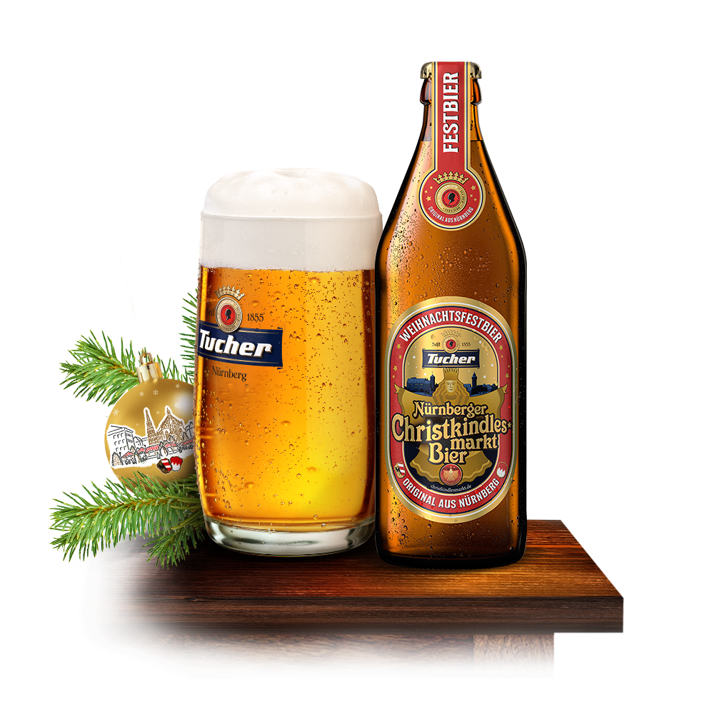 Ein Glas gefüllt mit goldenem Bier neben einer Bierflasche steht auf einem Holztisch.